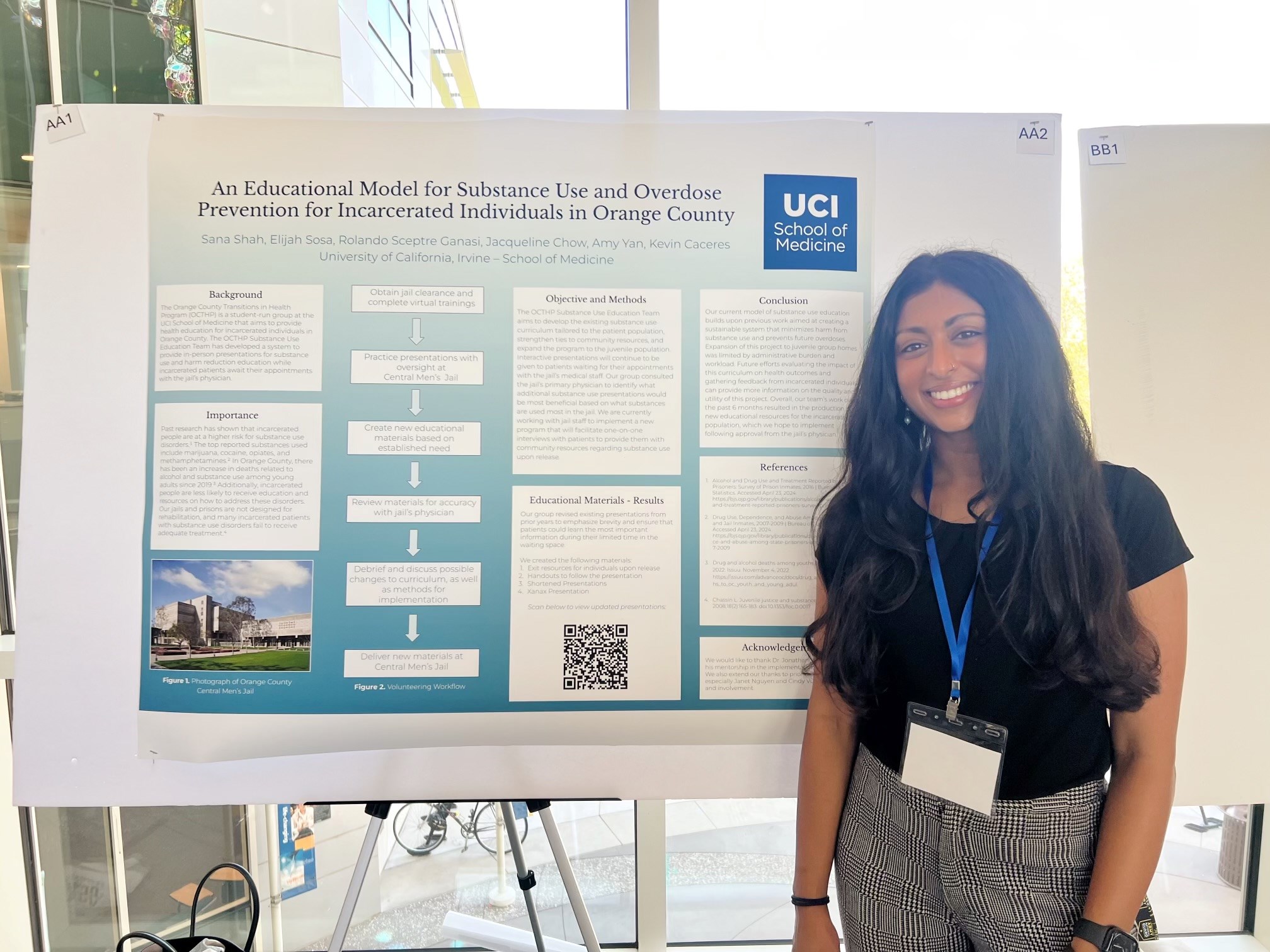 Sana S. presenting her poster at the UCI School of Medicine, sharing her research and insights with the academic community.