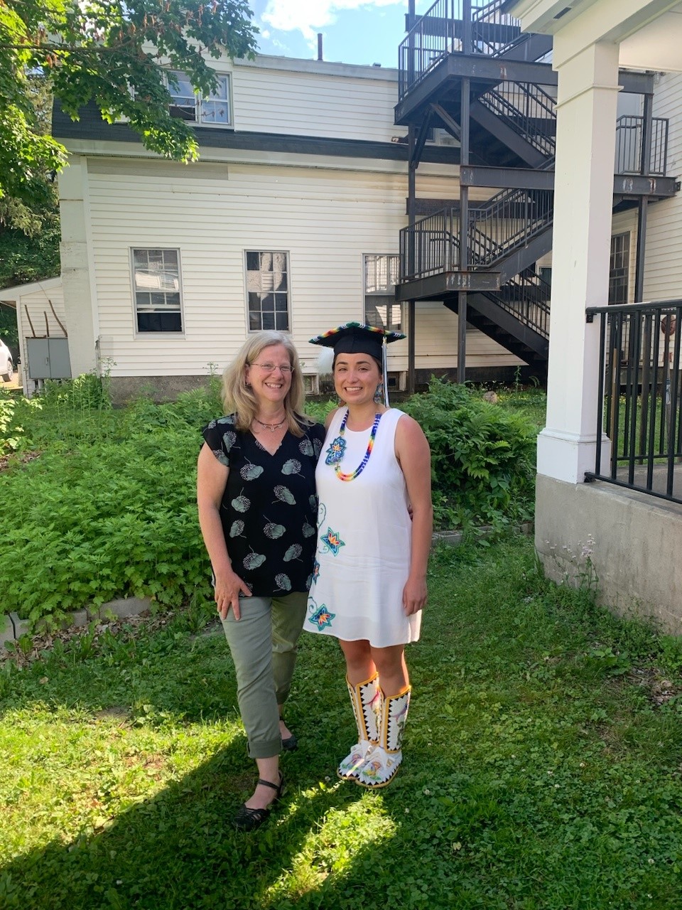Shelby and Prehealth Advisor Sarah Berger at graduation June 2021
