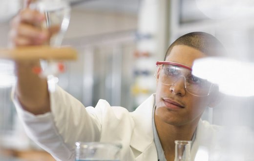 male student working in chemistry lab