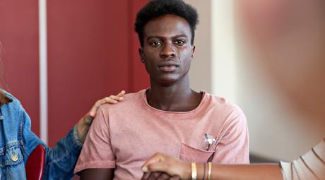 A student tearing up