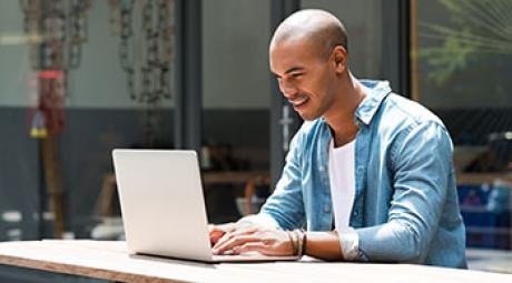 Student studying at a computer