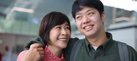 Parent and student at airport