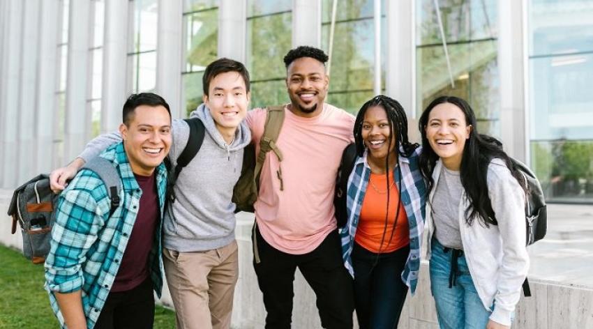 Diverse group of five college students